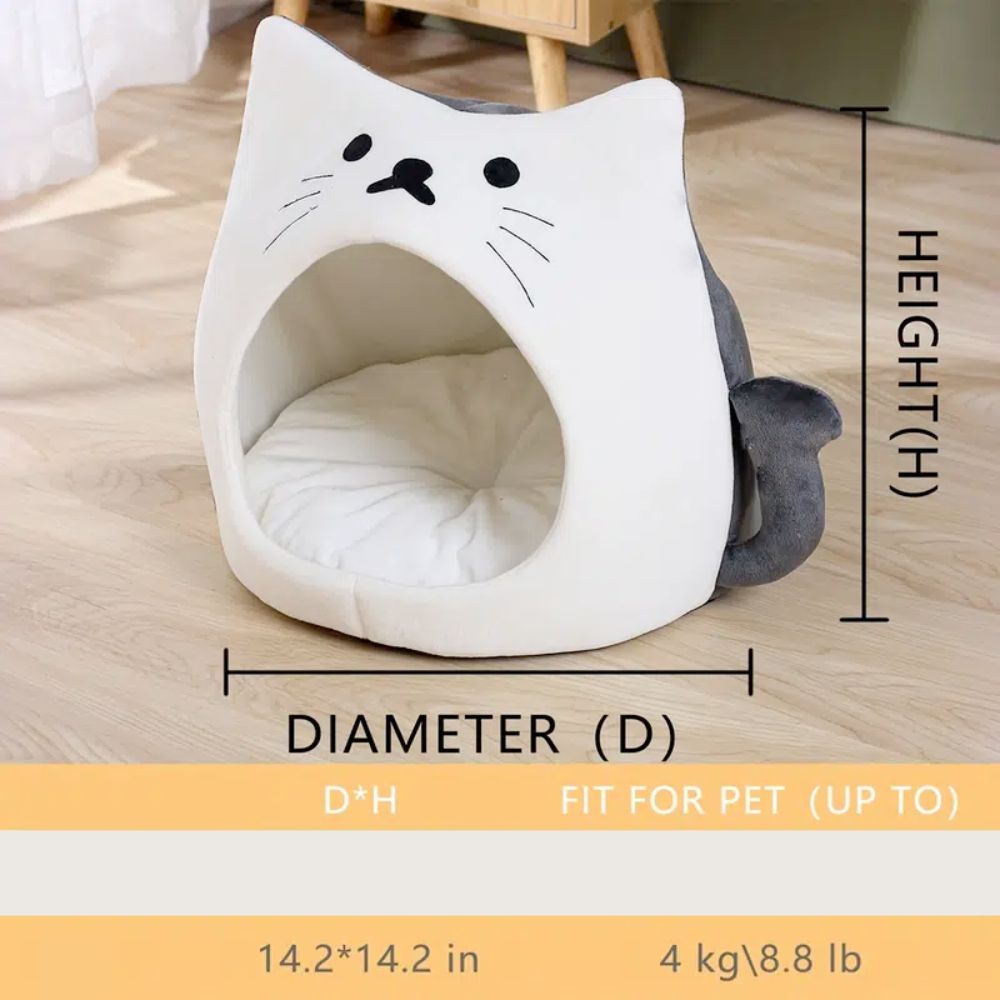 Adorable cat-shaped pet house with soft padded bed, perfect for small pets.