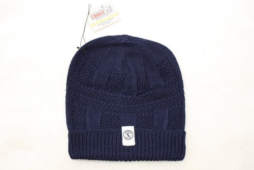 Adventure Required Hillary Alpaca Hat, hand-knit from 100% baby alpaca wool, showcasing unique patterns and textures.