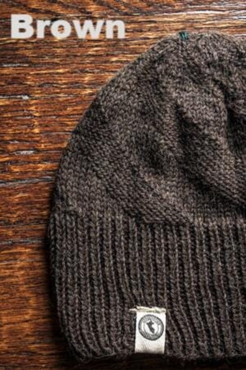 Kingsley Alpaca Hat made from 100% baby alpaca wool, hand-knit by Quechua artisans in Peru, featuring a stylish design for warmth and comfort.