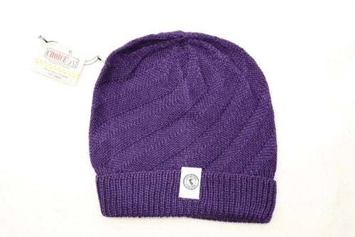 Kingsley Alpaca Hat made from 100% baby alpaca wool, hand-knit by Quechua artisans in Peru, featuring a stylish design for warmth and comfort.