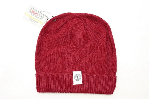 Kingsley Alpaca Hat made from 100% baby alpaca wool, hand-knit by Quechua artisans in Peru, featuring a stylish design for warmth and comfort.