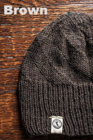 Kingsley Alpaca Hat made from 100% baby alpaca wool, hand-knit by Quechua artisans in Peru, featuring a stylish design for warmth and comfort.