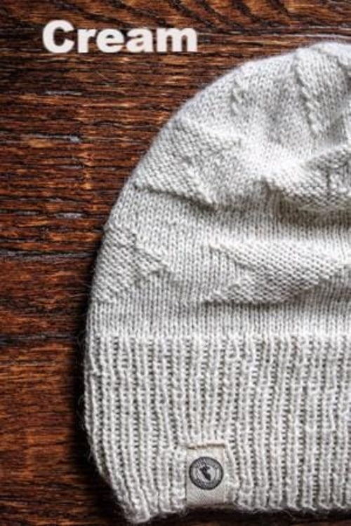 Adventure Required Messner Alpaca Hat, hand-knit from 100% baby alpaca wool, showcasing a stylish design inspired by great explorers.