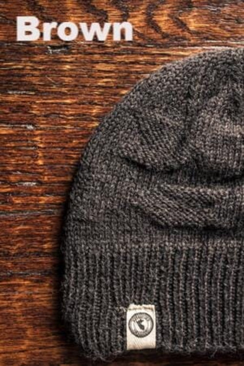 Adventure Required Messner Alpaca Hat, hand-knit from 100% baby alpaca wool, showcasing a stylish design inspired by great explorers.