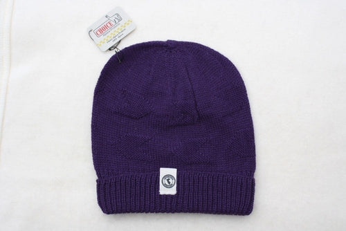 Adventure Required Messner Alpaca Hat, hand-knit from 100% baby alpaca wool, showcasing a stylish design inspired by great explorers.