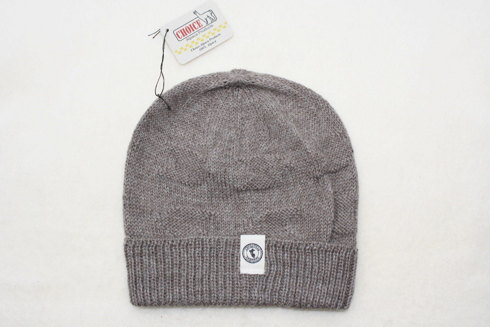 Adventure Required Messner Alpaca Hat, hand-knit from 100% baby alpaca wool, showcasing a stylish design inspired by great explorers.