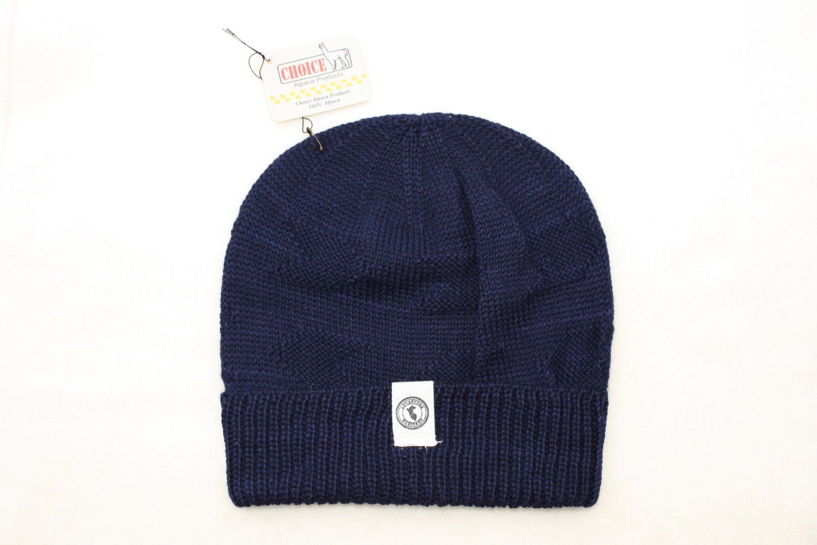 Adventure Required Messner Alpaca Hat, hand-knit from 100% baby alpaca wool, showcasing a stylish design inspired by great explorers.