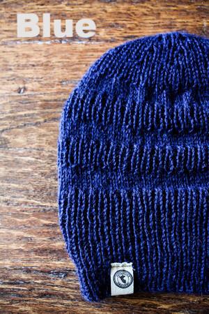 Roosevelt Alpaca Hat made from 100% baby alpaca wool, hand-knit by Quechua artisans in Peru, featuring a stylish design inspired by explorers.