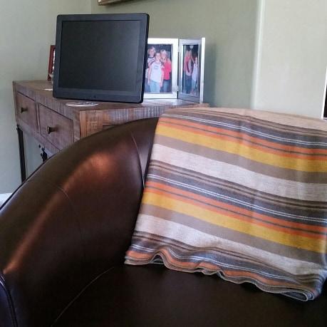 Luxurious Alpaca at Home Alpaca Throw with brushed stripes, perfect for cozying up at home or as a gift.