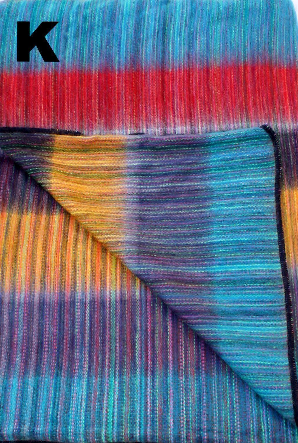 Luxurious Alpaca at Home Alpaca Throw with brushed stripes, perfect for cozying up at home or as a gift.