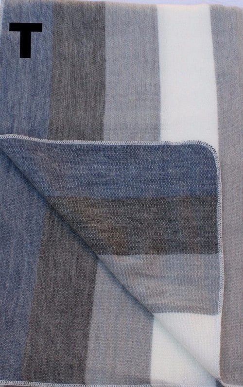 Luxurious Alpaca at Home Alpaca Throw with brushed stripes, perfect for cozying up at home or as a gift.