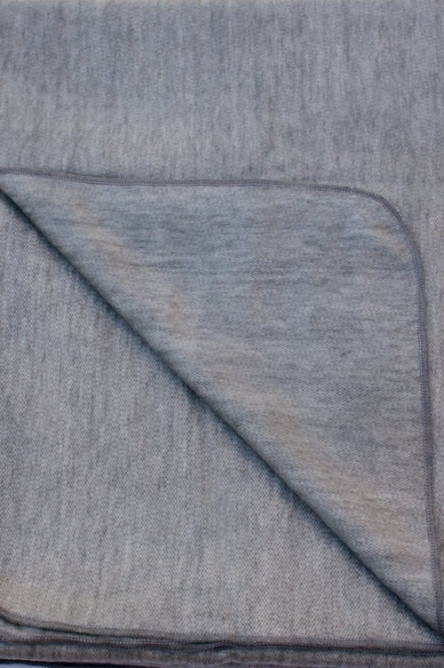 Luxurious Alpaca at Home Alpaca Throw with brushed stripes, perfect for cozying up at home or as a gift.