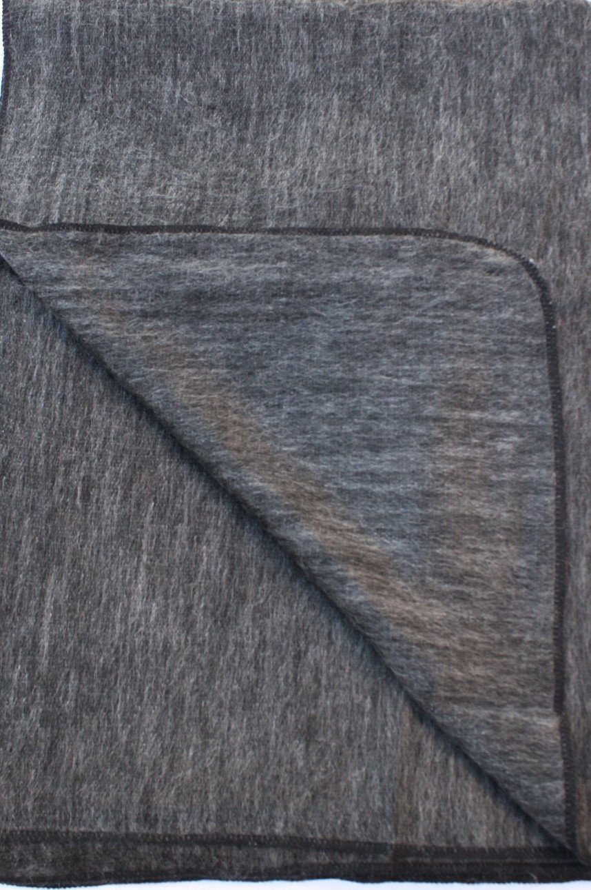 Luxurious Alpaca at Home Alpaca Throw with brushed stripes, perfect for cozying up at home or as a gift.