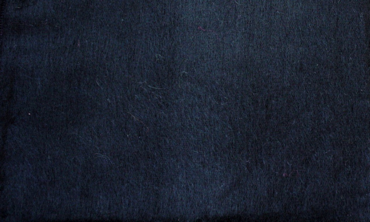 Luxurious Alpaca at Home Alpaca Throw with brushed stripes, perfect for cozying up at home or as a gift.