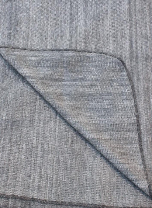 Luxurious Alpaca at Home Alpaca Throw featuring a brushed striped design, perfect for cozying up at home or on the go.