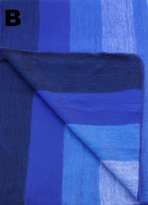 Luxurious Alpaca at Home Alpaca Throw featuring a brushed striped design, perfect for cozying up at home or on the go.