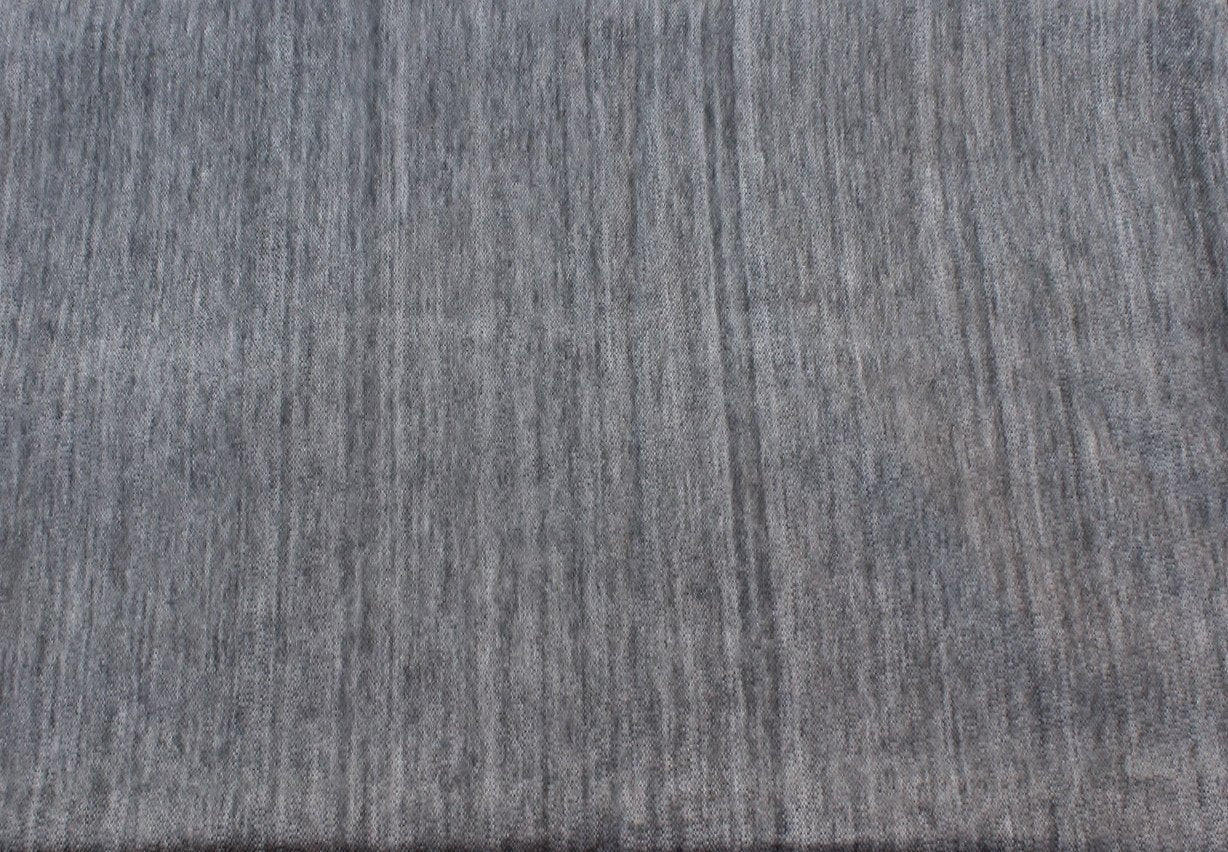 Luxurious alpaca bed blanket in various colors, showcasing its soft texture and oversized design, perfect for cozy nights.