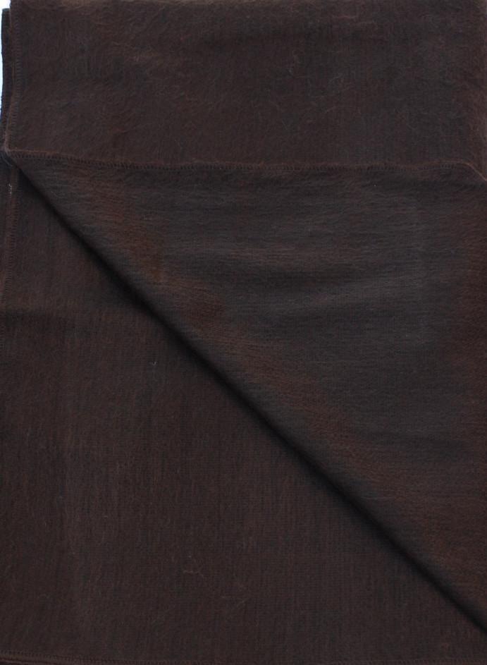 Luxurious alpaca bed blanket in various colors, showcasing its soft texture and oversized design, perfect for cozy nights.