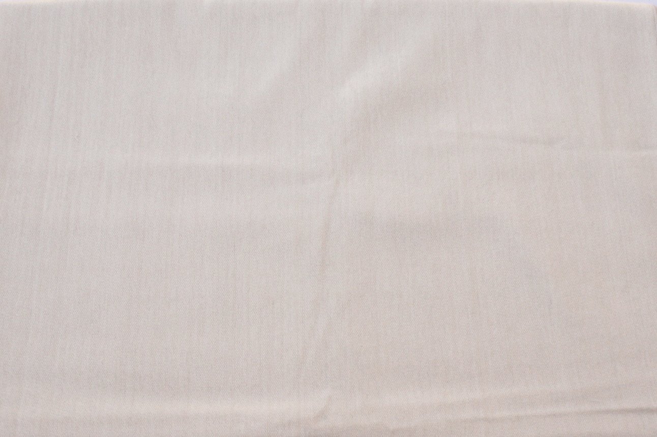 Luxurious alpaca bed blanket in various colors, showcasing its soft texture and oversized design, perfect for cozy nights.