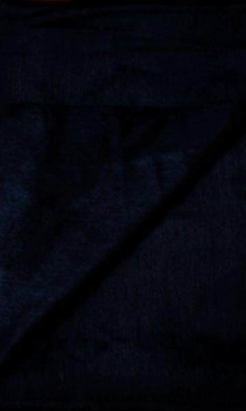 Luxurious alpaca bed blanket in various colors, showcasing its soft texture and oversized design, perfect for cozy nights.