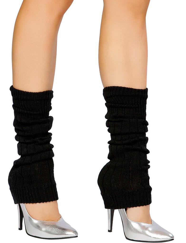 A pair of stylish thick cabled alpaca leg warmers in a cozy setting, showcasing their soft texture and fashionable design.