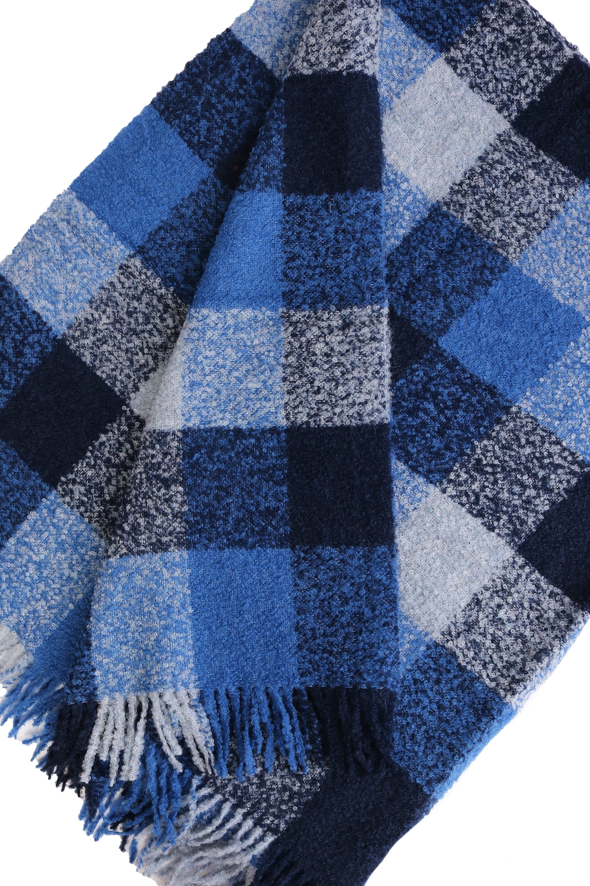 Luxurious blue grey checkered plaid made from 100% alpaca wool, showcasing intricate craftsmanship and elegant design.