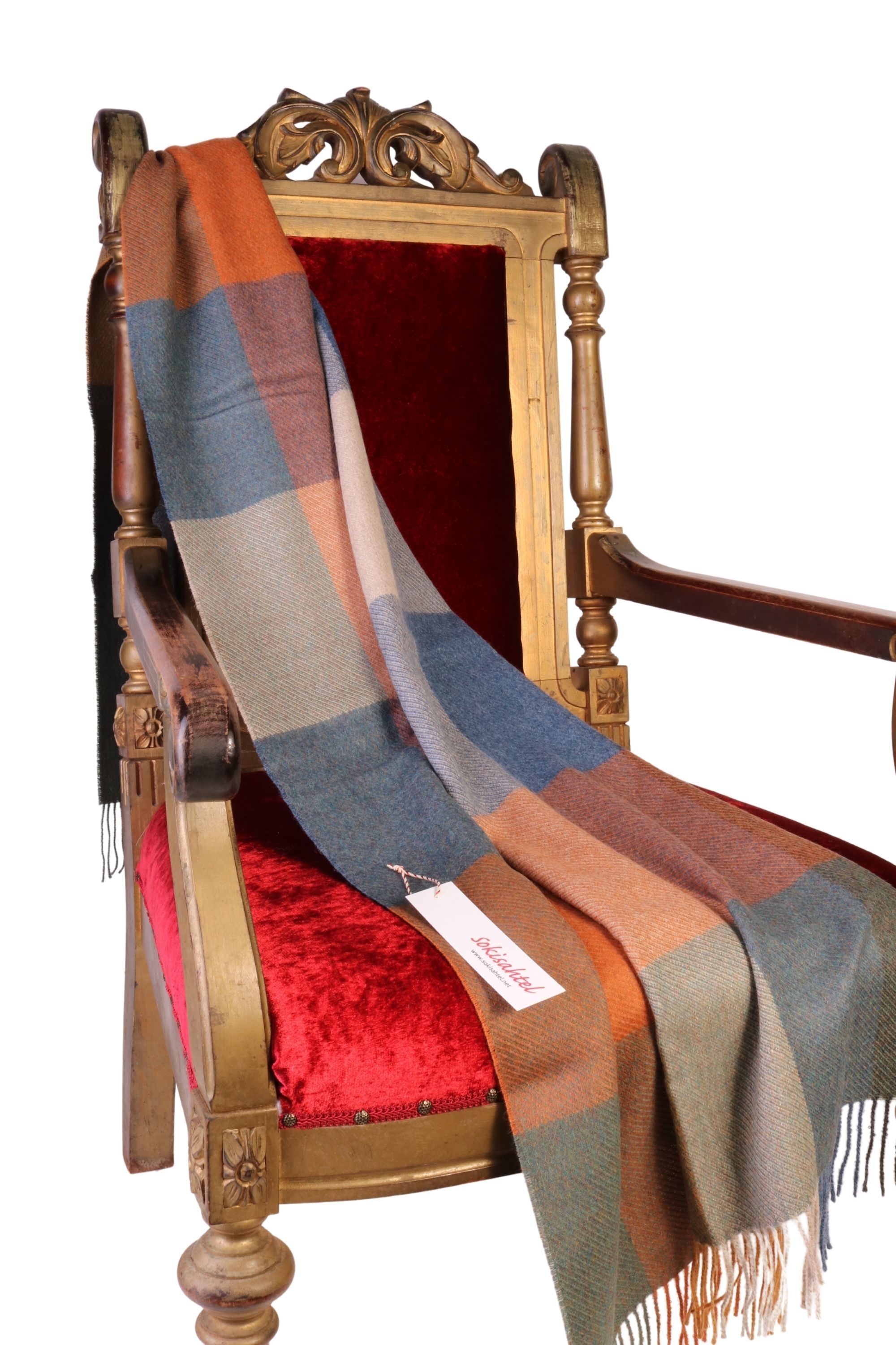 Luxurious Alpaca wool colourful checked small plaid throw, showcasing vibrant colors and soft texture, perfect for cozying up in winter.