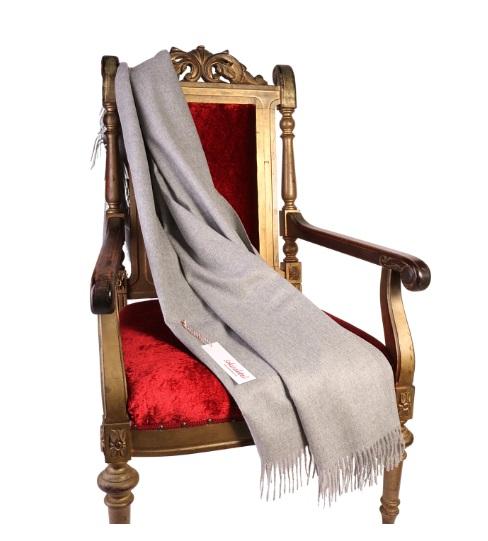 Luxurious grey plaid made from 100% baby alpaca wool, showcasing its soft texture and elegant design.