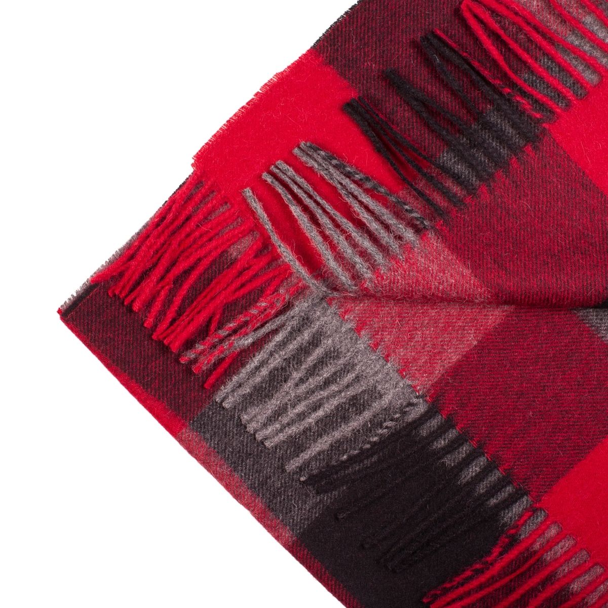 Luxurious red checked scarf made from 100% baby alpaca wool, showcasing its soft texture and stylish design.