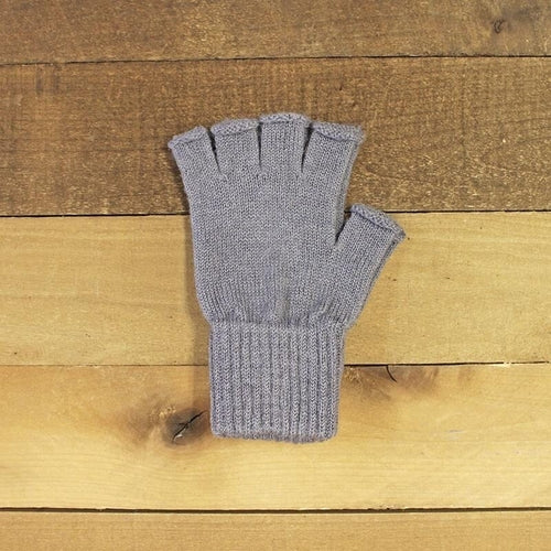 A pair of stylish fingerless alpaca gloves in natural colors, showcasing their soft texture and warm design, perfect for texting and outdoor activities.