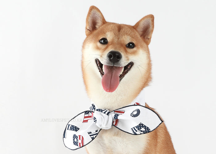 A stylish and breathable Alphabet Form-Scarf for pets, made from 100% handmade cotton in a mix of colors, perfect for summer wear.