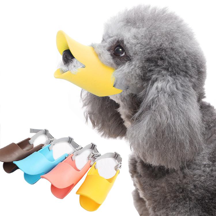 A cute yellow silicone duck muzzle designed for dogs, showcasing its soft material and adjustable straps for comfort.