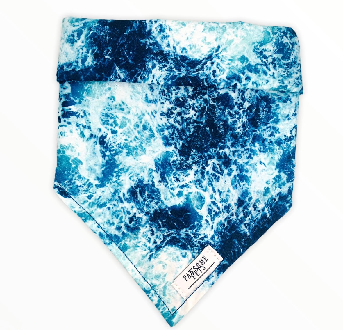 Ocean Blue Bandana for pets, handmade from 100% cotton with a faux leather logo patch, showcasing its vibrant color and stylish design.