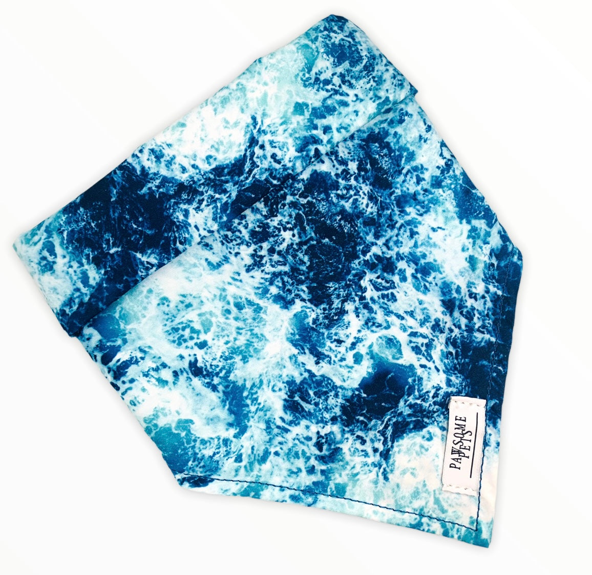 Ocean Blue Bandana for pets, handmade from 100% cotton with a faux leather logo patch, showcasing its vibrant color and stylish design.