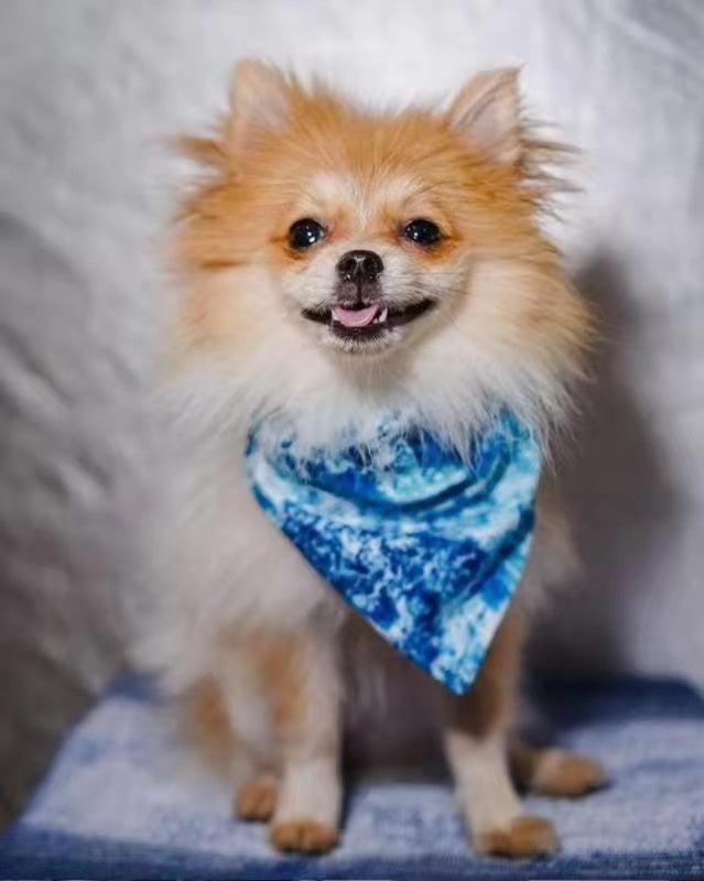 Ocean Blue Bandana for pets, handmade from 100% cotton with a faux leather logo patch, showcasing its vibrant color and stylish design.