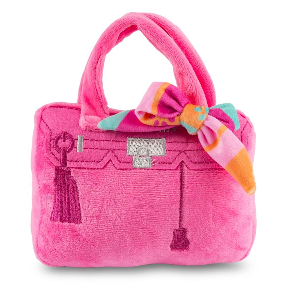 Barkin Bag in pink with Rich Bitch embroidery, featuring a plush exterior and a fun squeaker, perfect for pampered dogs.