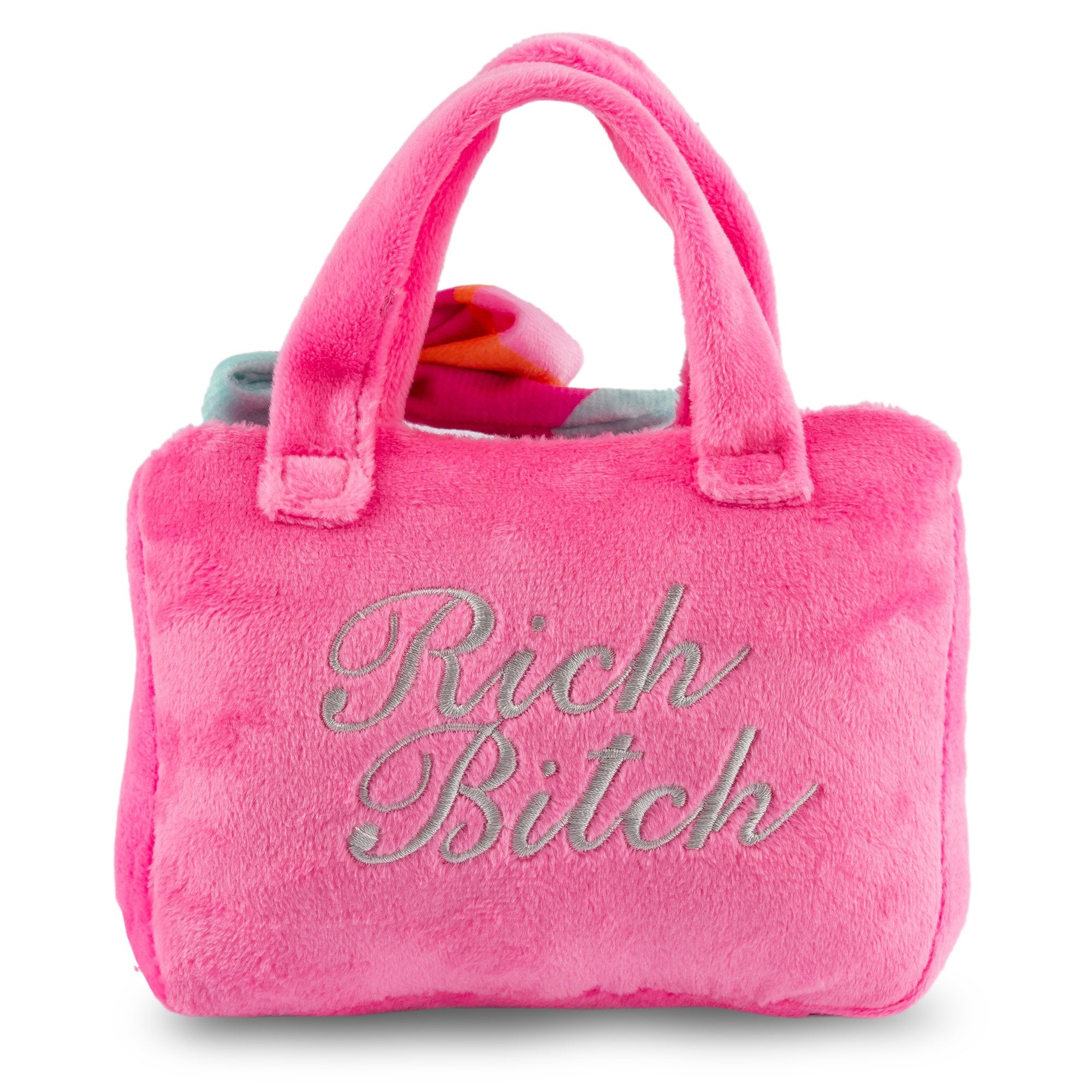 Barkin Bag in pink with Rich Bitch embroidery, featuring a plush exterior and a fun squeaker, perfect for pampered dogs.