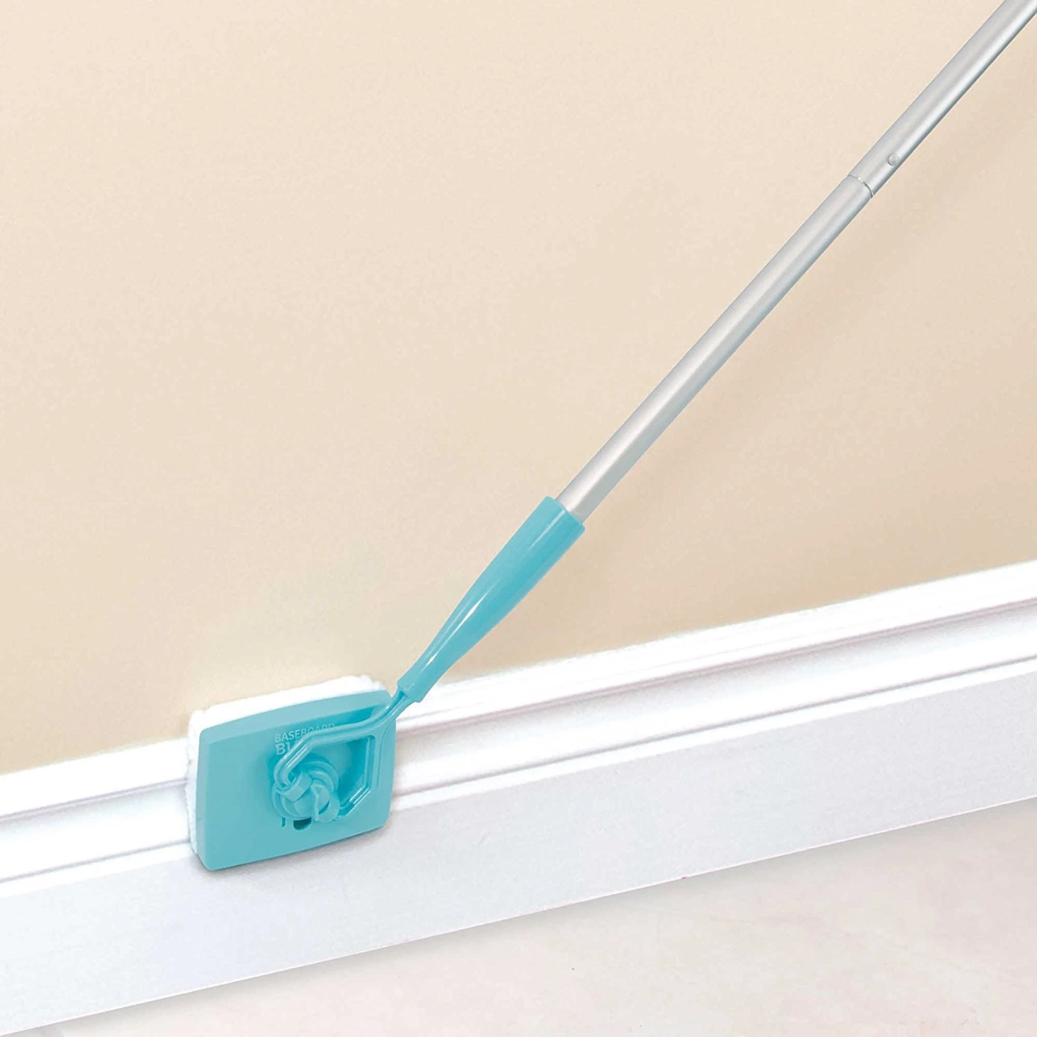 Baseboard Buddy Retractable Household Universal Cleaning Brush Mop with microfiber mat and adjustable length, ideal for cleaning baseboards and hard-to-reach areas.