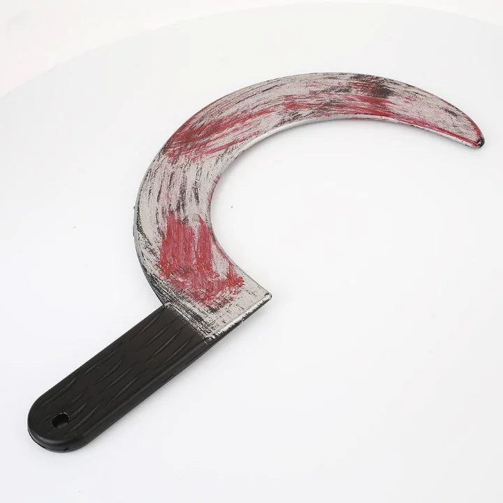 A collection of bloody Halloween props including a knife, chopper, sickle, and axe, showcasing realistic blood-stained details.