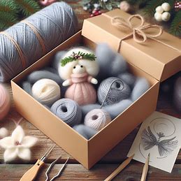 Boîte à Feutrer contenant de l'alpaga naturel et des accessoires colorés pour le feutrage.