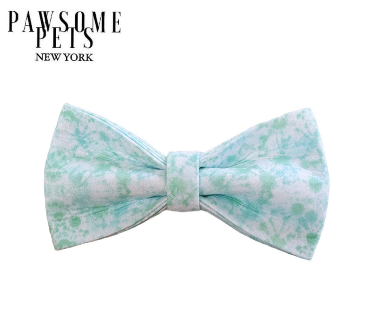 A stylish mint leaf patterned bow tie for pets, featuring Velcro straps for easy attachment to collars.