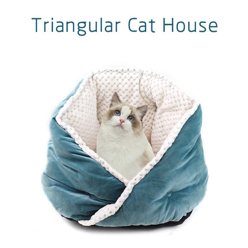 Soft triangular cat bed in warm colors, perfect for pets to snuggle and sleep comfortably.