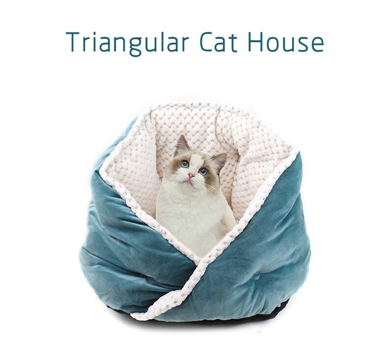 Soft triangular cat bed in warm colors, perfect for pets to snuggle and sleep comfortably.