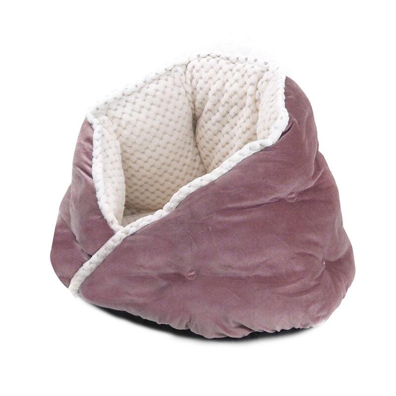 Soft triangular cat bed in warm colors, perfect for pets to snuggle and sleep comfortably.