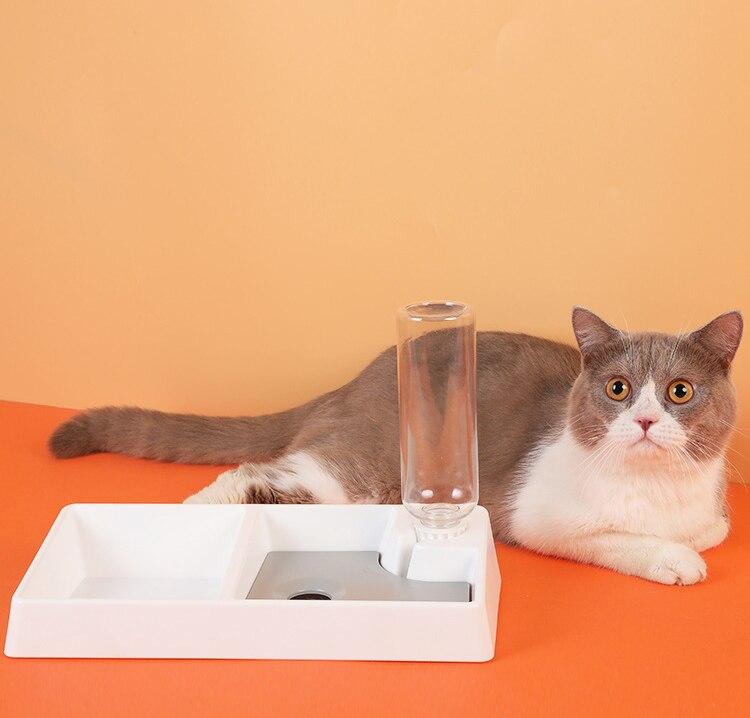 Cat Bowl Dog Water Feeder, a versatile automatic drinking fountain for cats and dogs, made of durable plastic with a gravity-powered water dispenser.