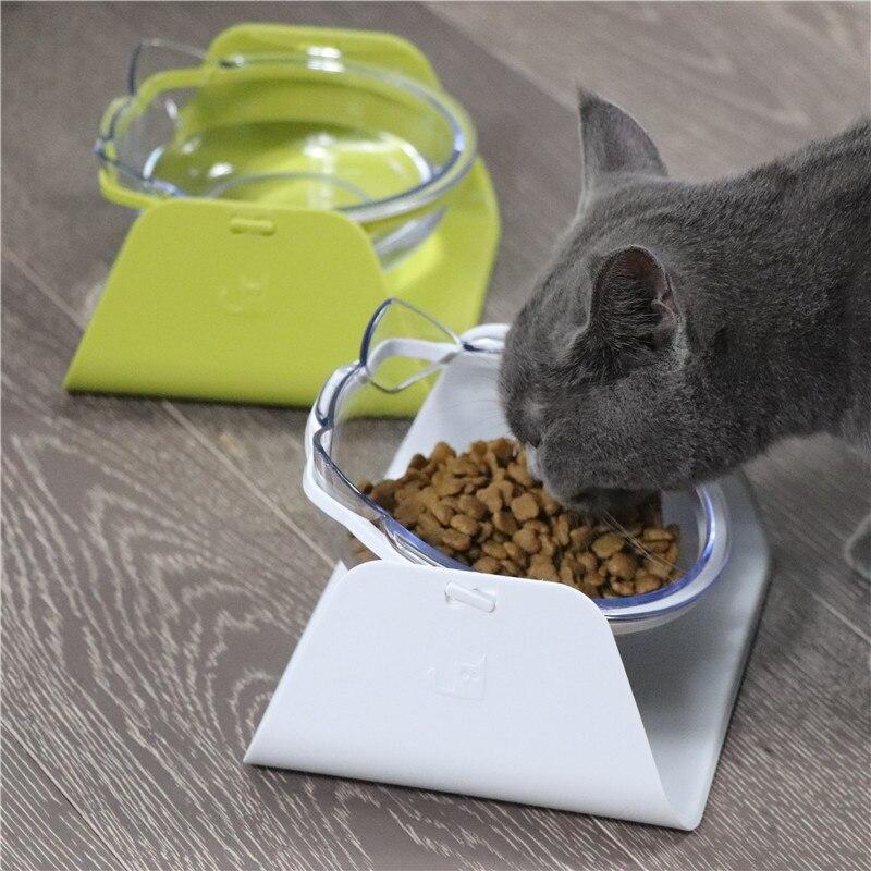 Cat feeding bowl set with raised stand, featuring double bowls for food and water, designed for comfort and convenience.
