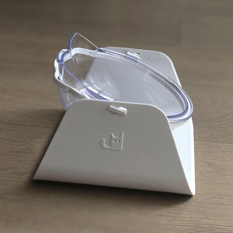 Cat feeding bowl set with raised stand, featuring double bowls for food and water, designed for comfort and convenience.