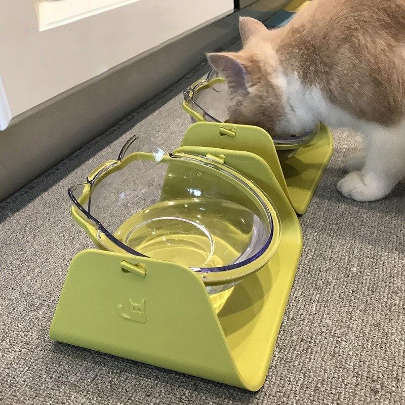 Cat feeding bowl set with raised stand, featuring double bowls for food and water, designed for comfort and convenience.