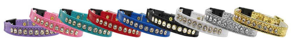 A stylish cat breakaway buckle collar adorned with a row of sparkling Austrian rhinestones, designed for safety and comfort.