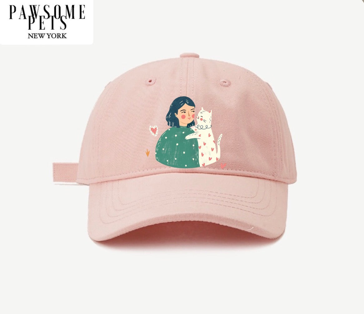 A stylish CAT MOM HAT featuring embroidered lettering, made from 100% cotton with an adjustable metal buckle closure.